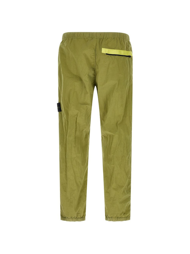 Stone Island green track pants outlook