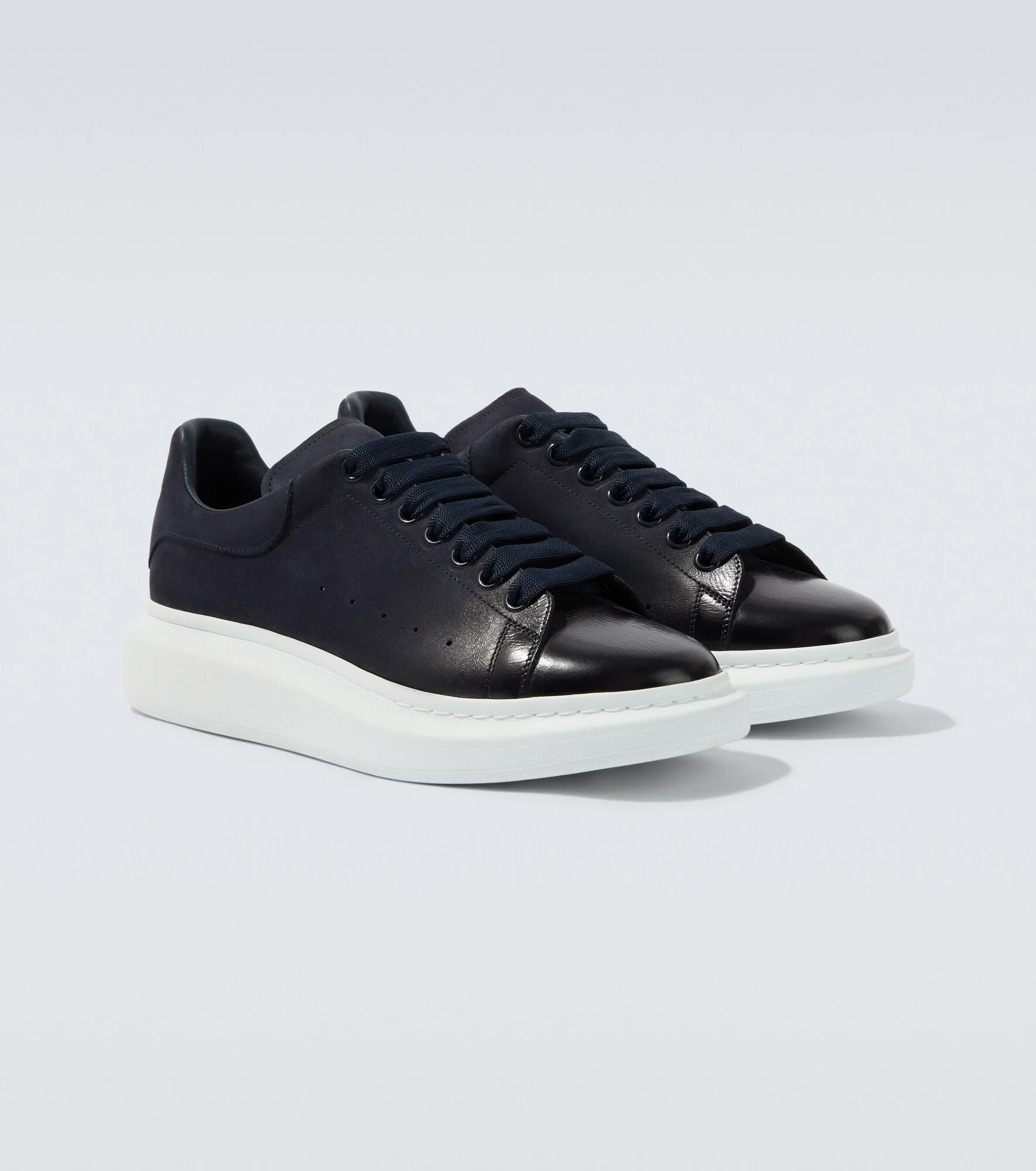 Oversized suede-trimmed leather sneakers - 1