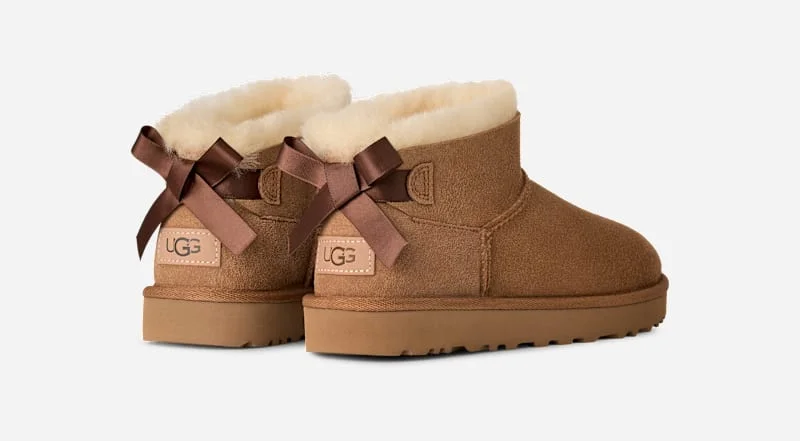 ® Women's Ultra Mini Bailey Bow Sheepskin Classic Boots in Chestnut - 1
