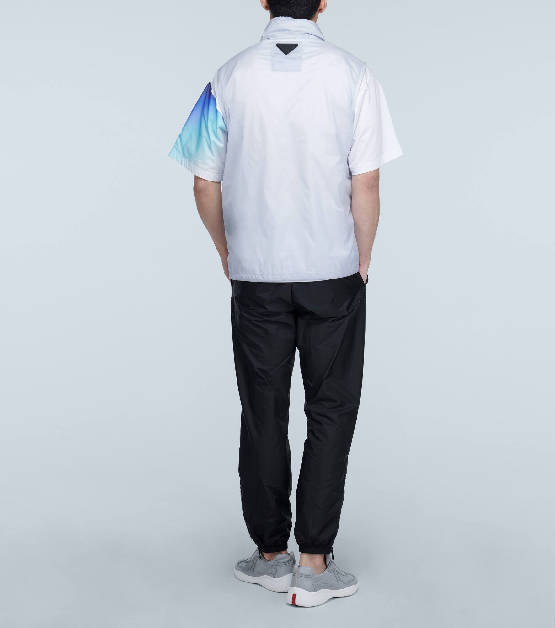 technical gilet with packaway hood - 3