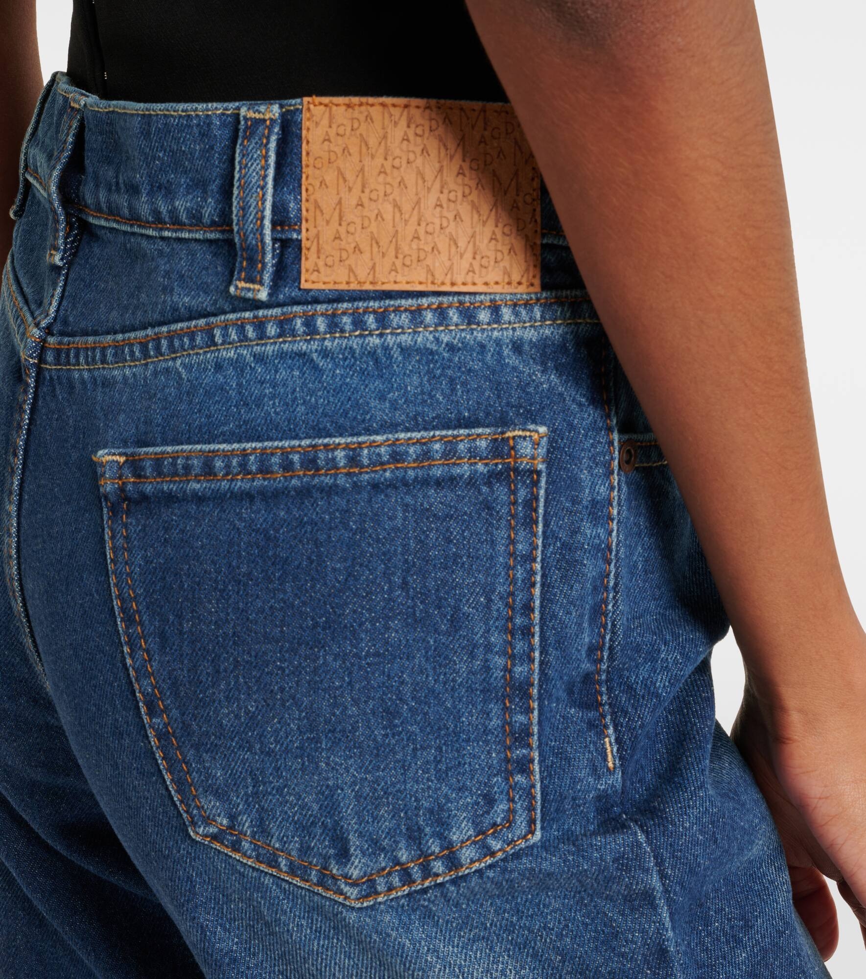 Low-rise flared jeans - 6