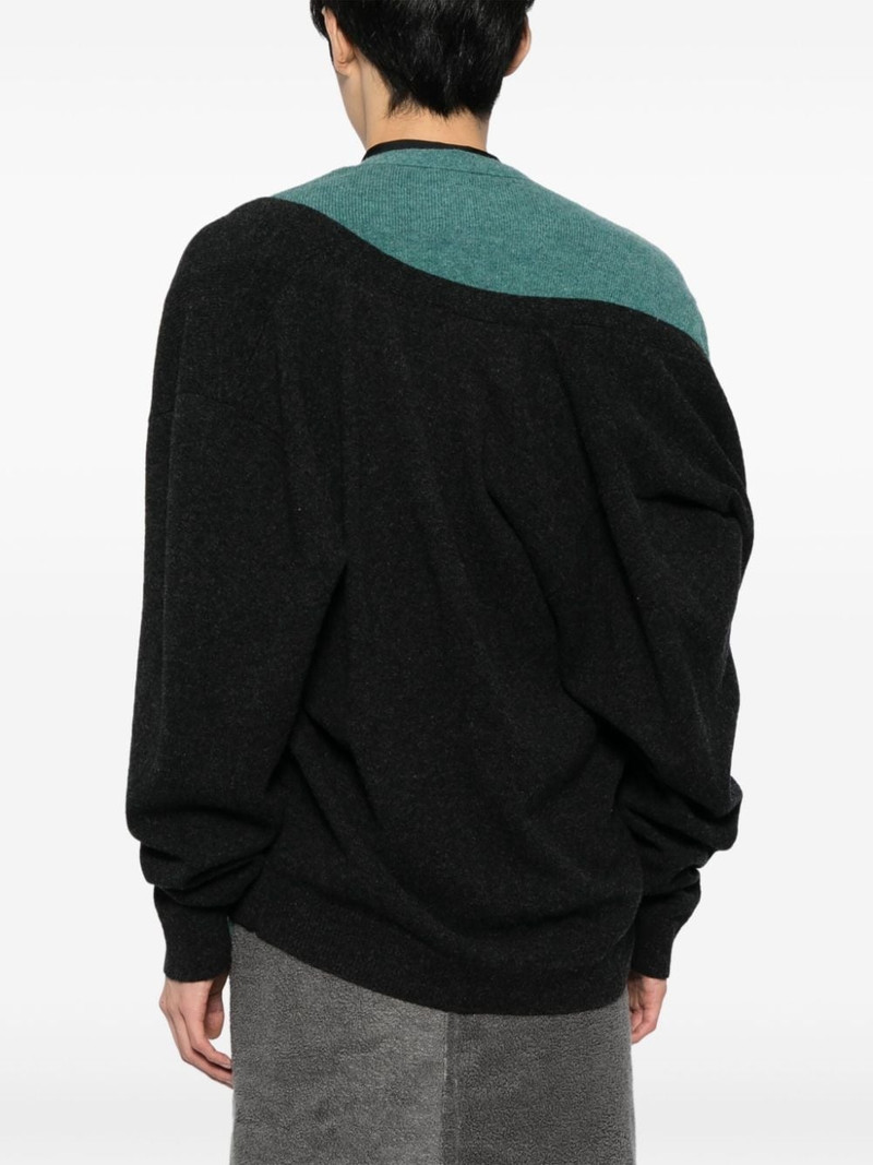 Undressed knitted cardigan 4