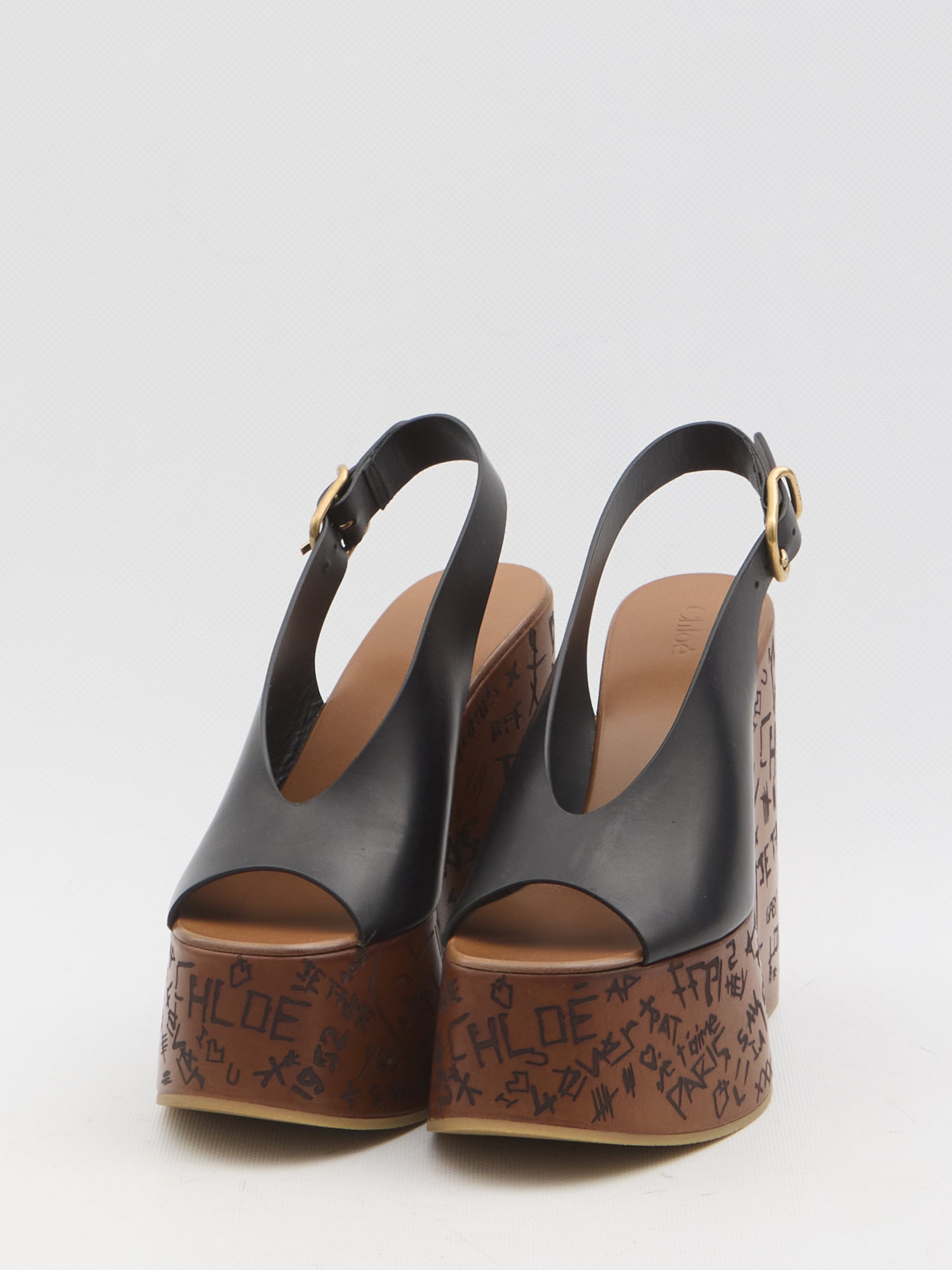 【関税＆送料込み】ChloAC 'Maxime' Sandals Chloé Maxime Leather Wedge Sandals | Saks Fifth Avenue