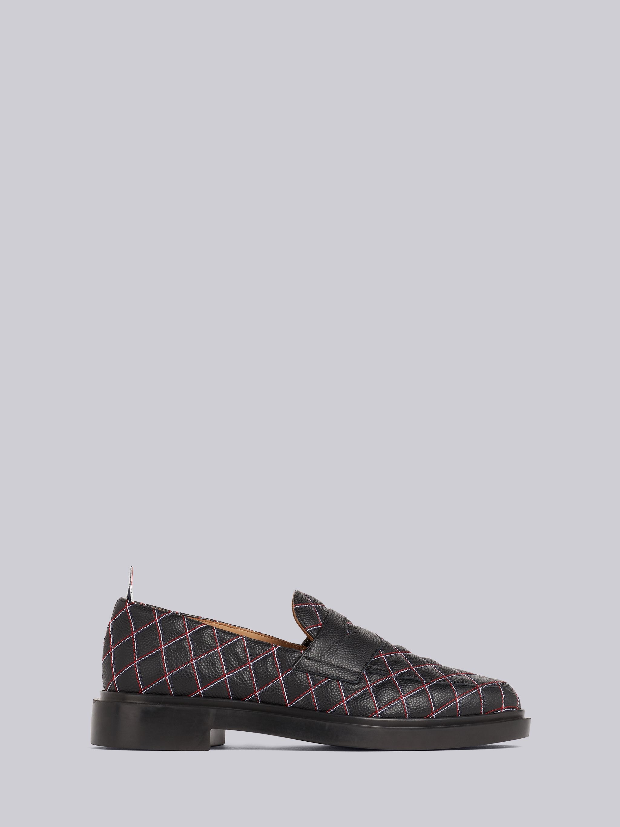 Black Pebbled Calfskin Criss-cross Stitch Penny Loafer - 1