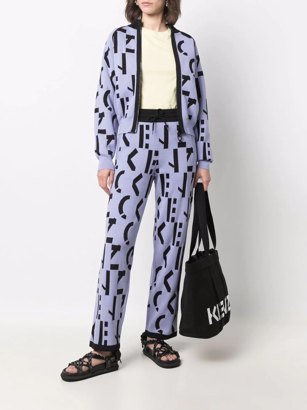 all-over logo-print trousers - 2