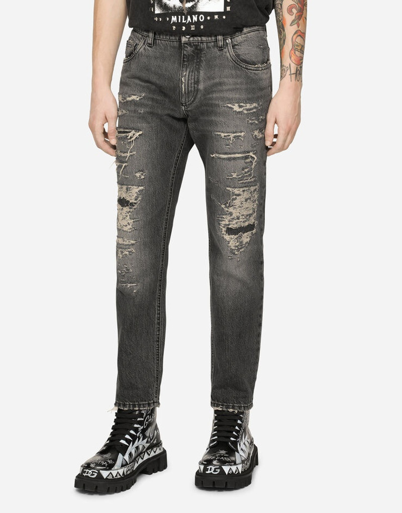 Loose gray jeans with repaired rips 4