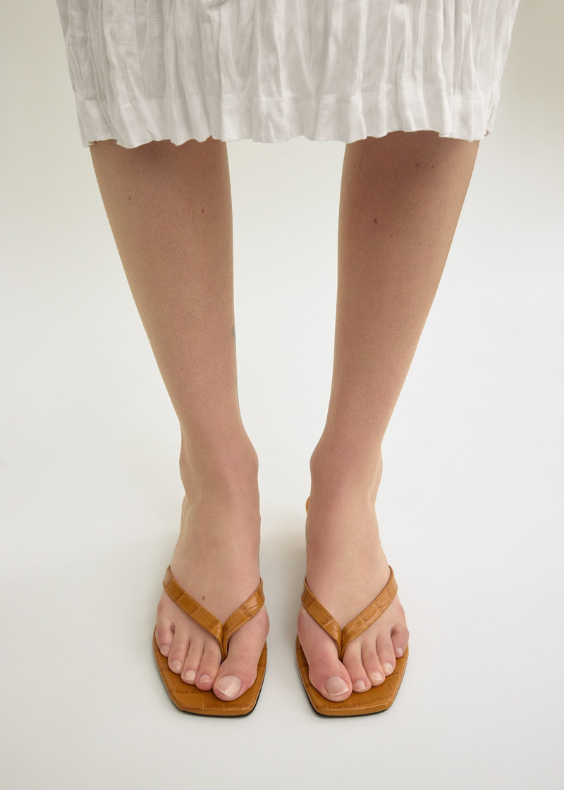 TOTEME Croco-embossed heeled flip flops tangerine outlook