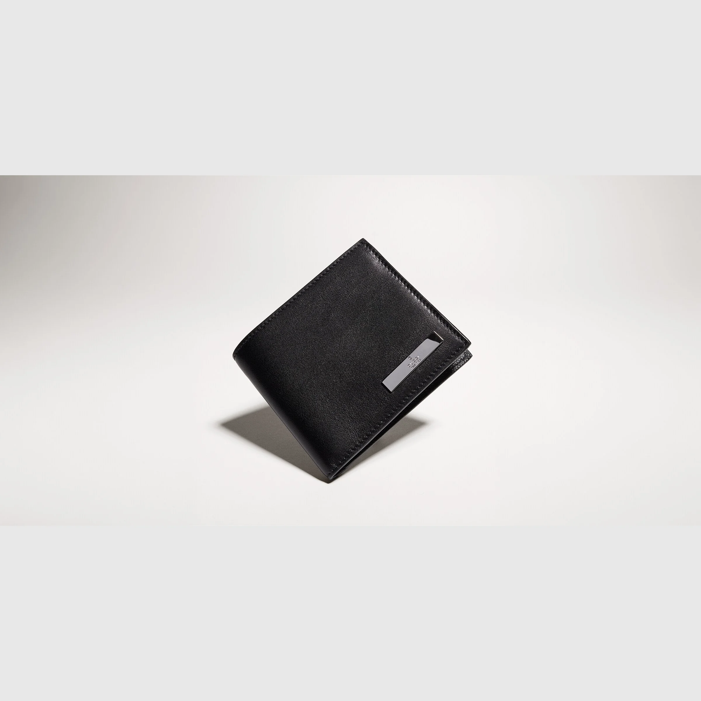 Bi-fold wallet with metal tag - 1