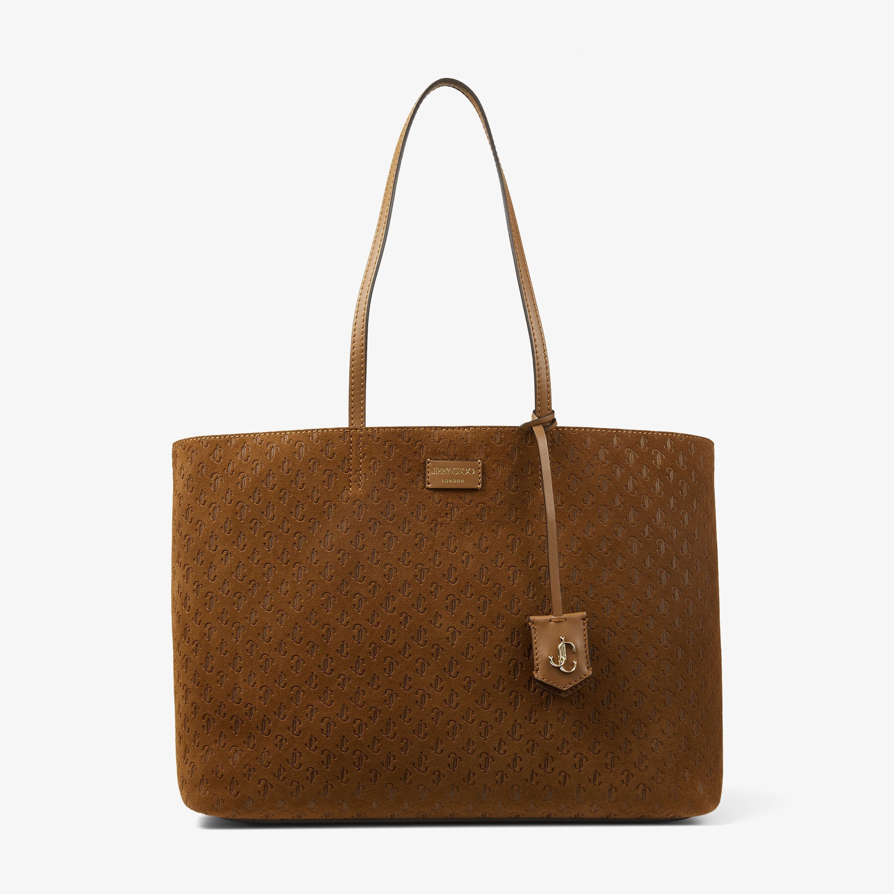 Nine2Five E/W
Dark Tan Suede Tote Bag with Embossed JC Monogram - 1