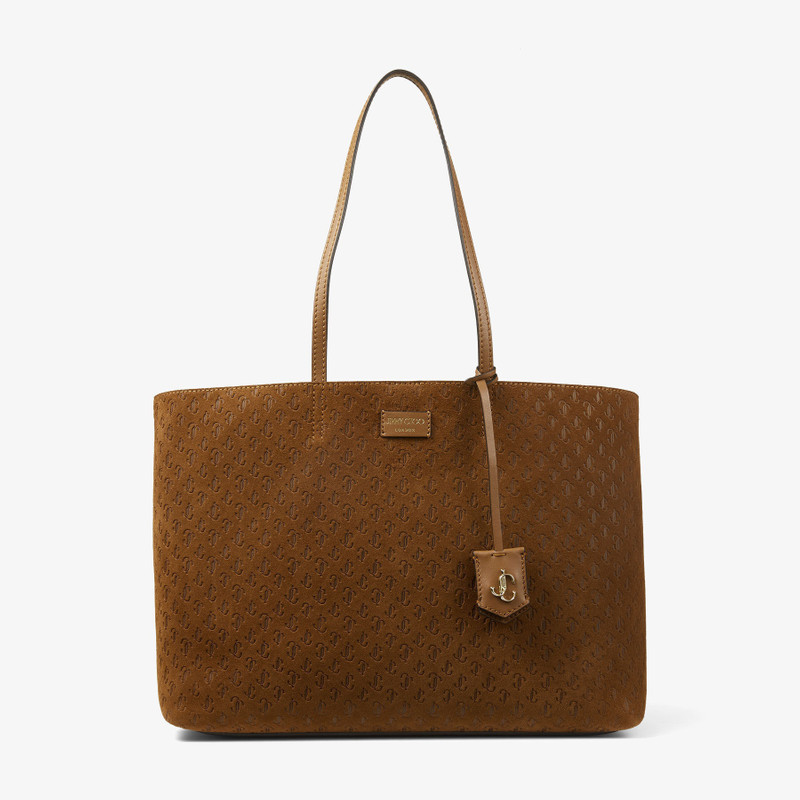 Nine2Five E/W
Dark Tan Suede Tote Bag with Embossed JC Monogram 1