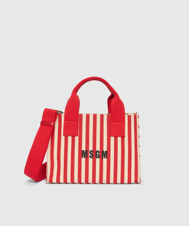 Small canvas tote with polka dot and stripe print. 1