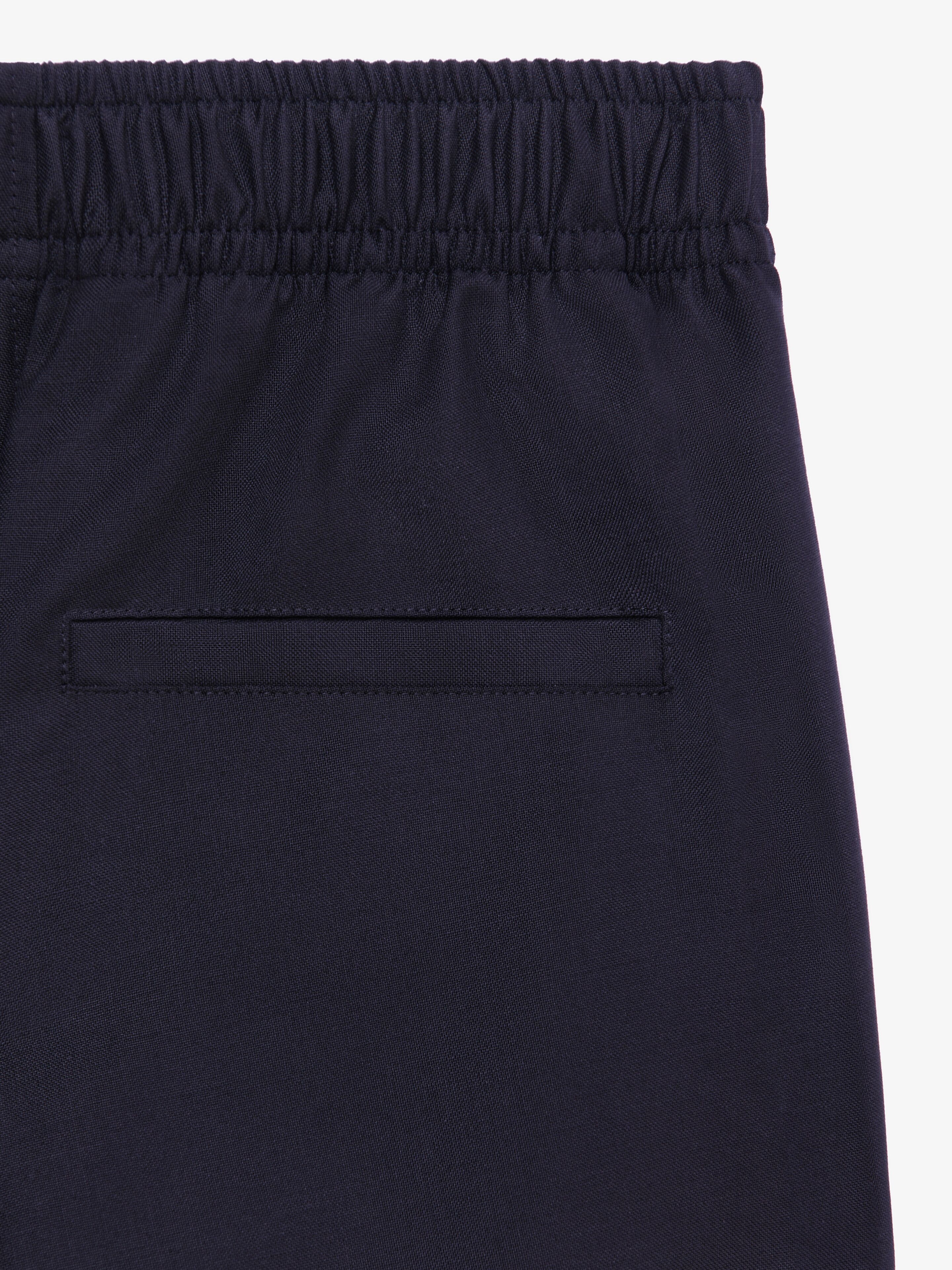 SLIM-FIT PANTS IN TECHNICAL WOOL - 6