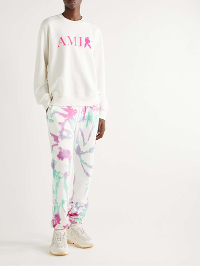 AMIRI Slim-Fit Tapered Tie-Dyed Cotton-Jersey Drawstring Sweatpants outlook