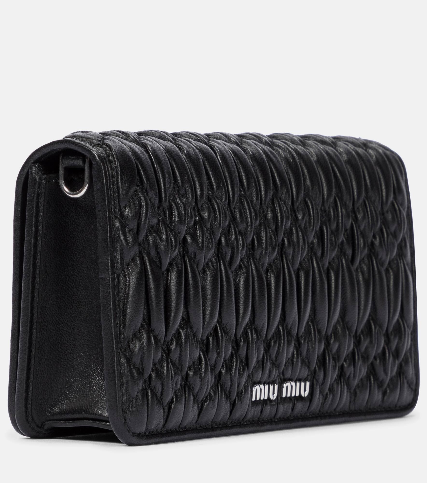 Embellished matelassé leather clutch - 4