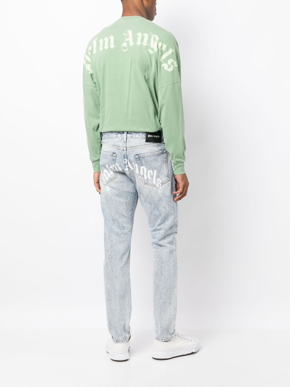 curved-logo print jeans - 2