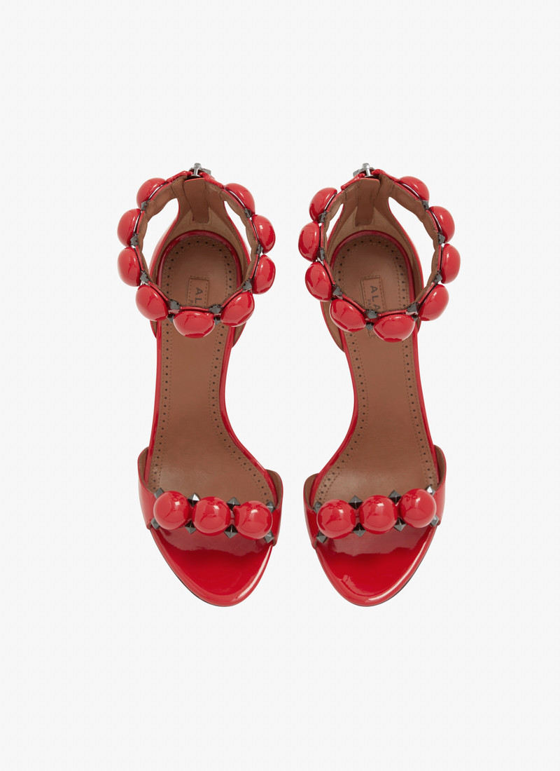 Alaïa BOMBE SANDALS IN PATENT CALFSKIN outlook