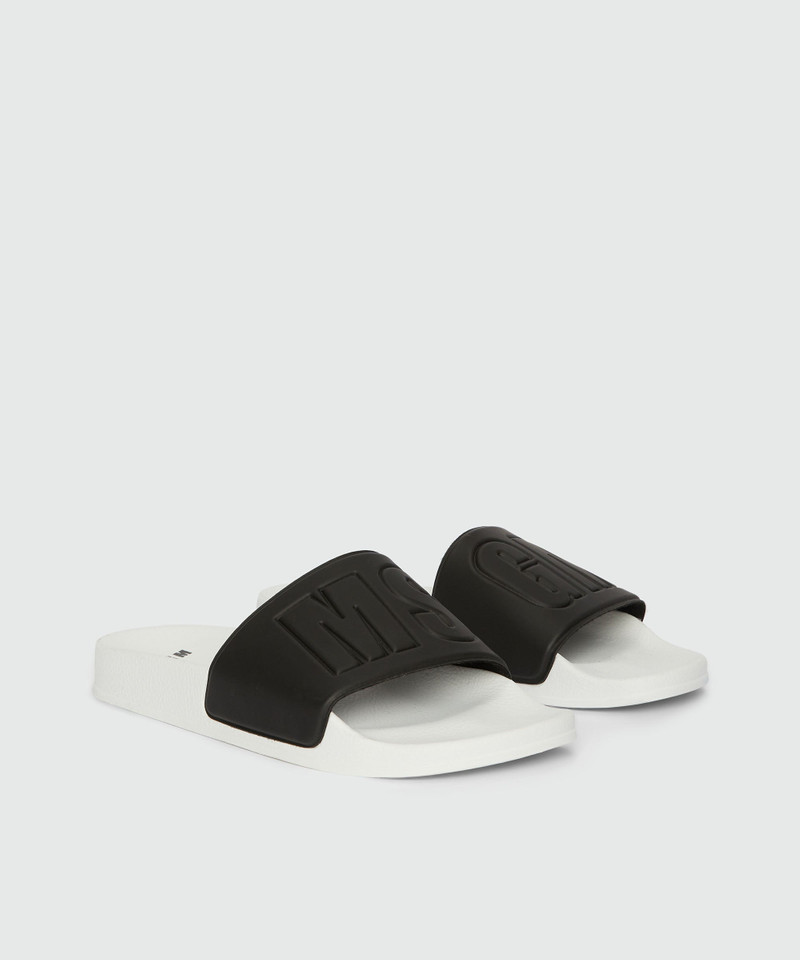 Black and white pool slides with MSGM macrologue 3