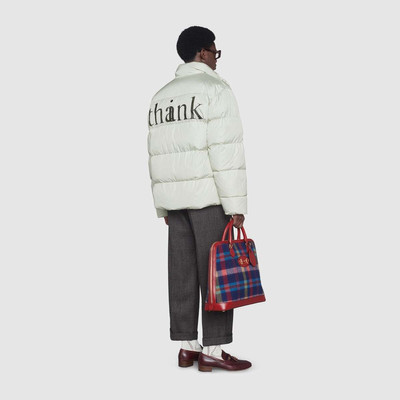 GUCCI 'think/thank' print nylon down jacket outlook