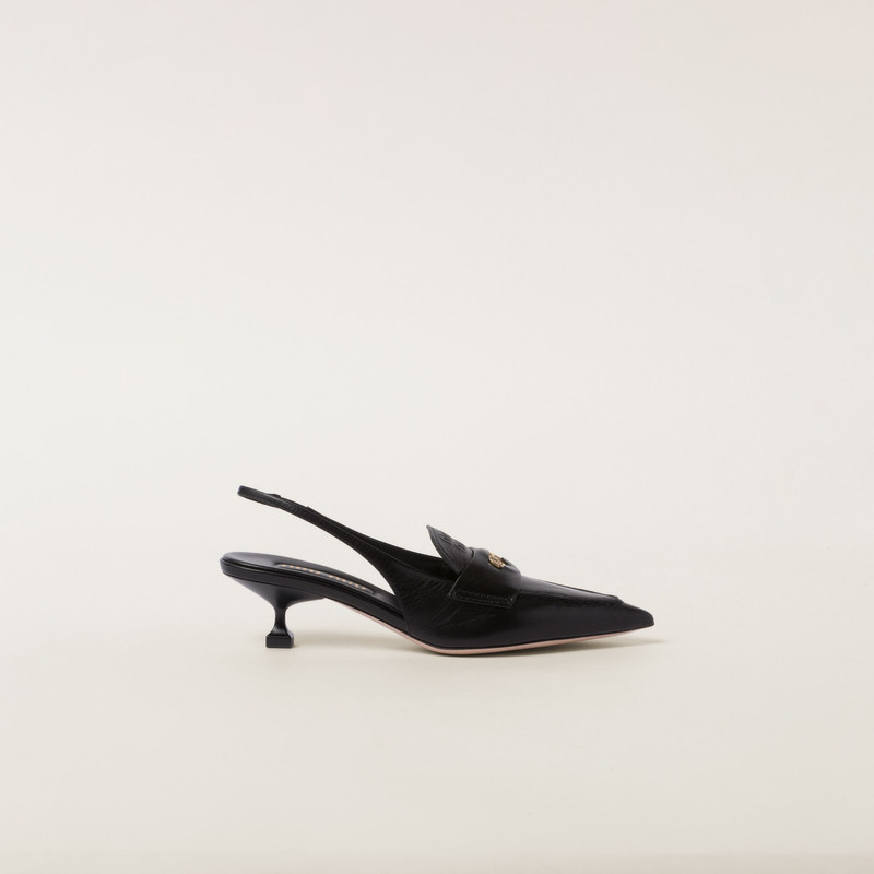 Miu Miu Leather penny loafers with heel outlook