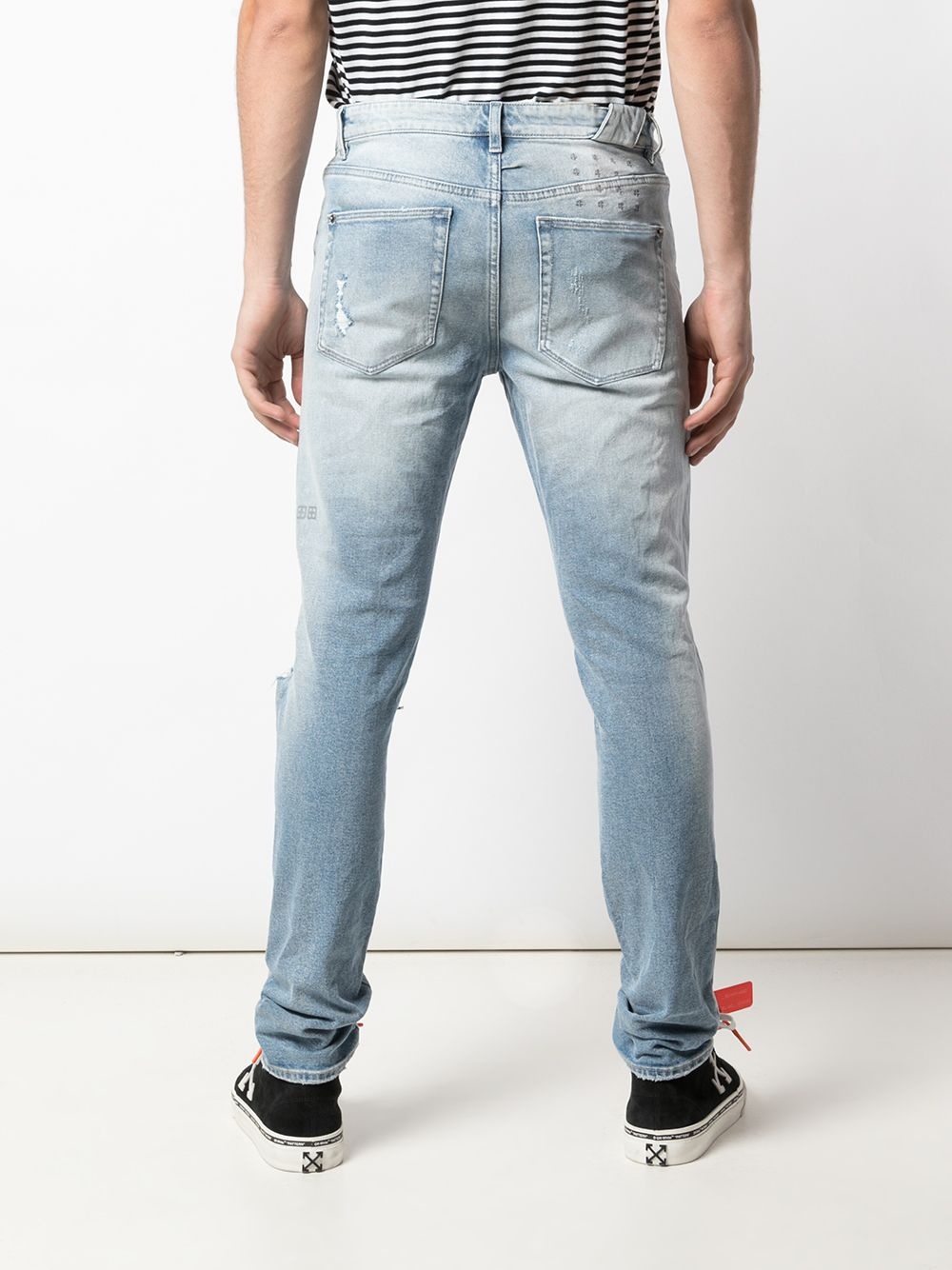 slim-fit distressed jeans - 4