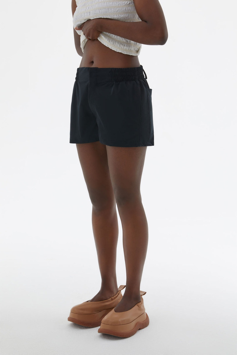 SUNNEI LIGHT TECH BLACK MINI SHORTS outlook