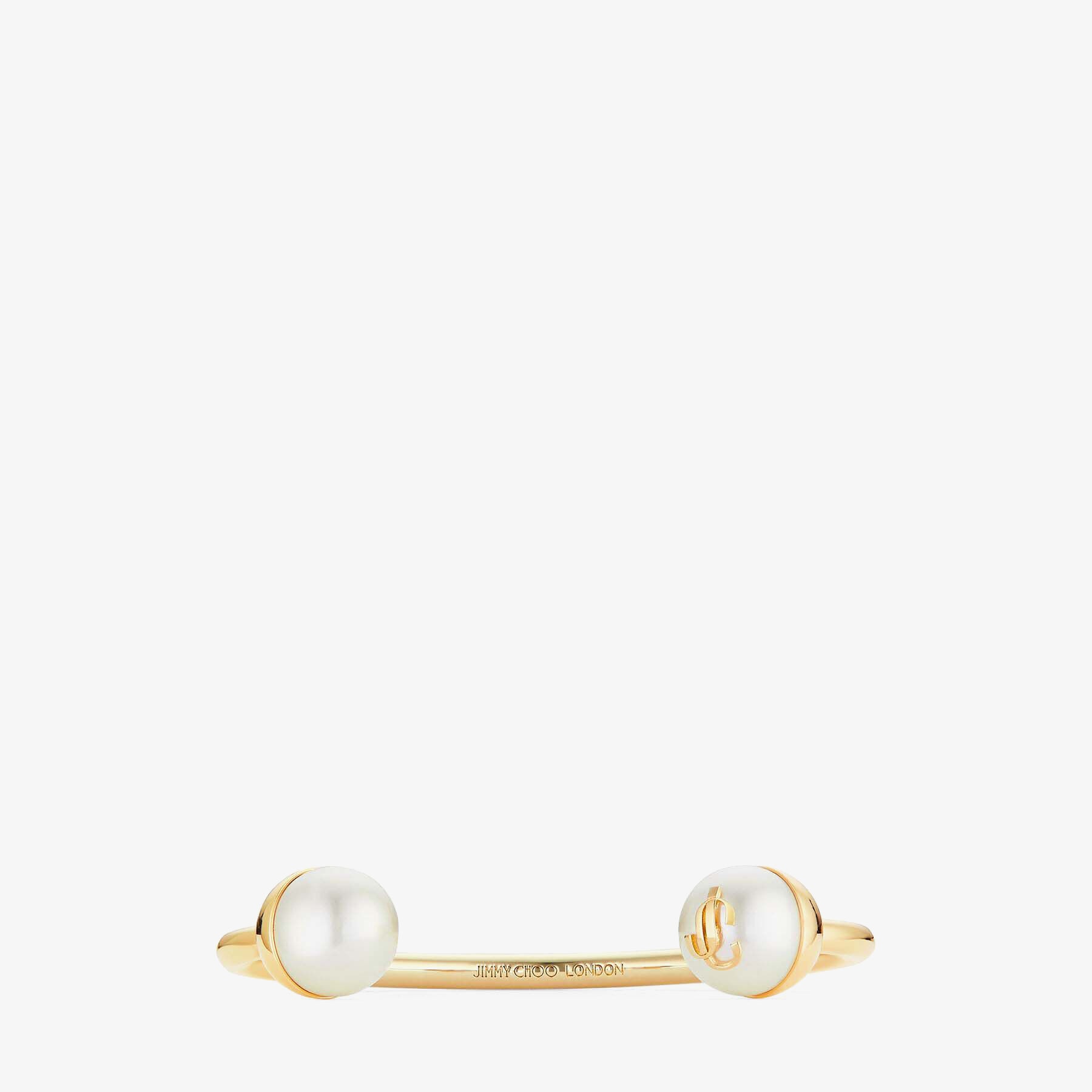 JC Pearl Cuff
Gold-Finish Metal Cuff Bracelet with Pearls - 4