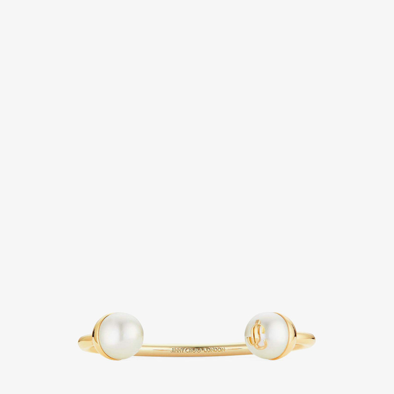 JC Pearl Cuff
Gold-Finish Metal Cuff Bracelet with Pearls 4