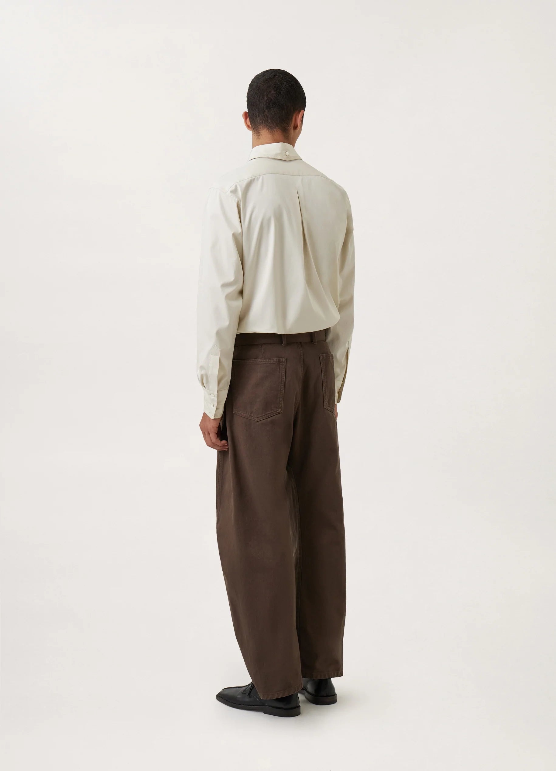 TWISTED BELTED PANTS
GARMENT DYED DENIM - 10