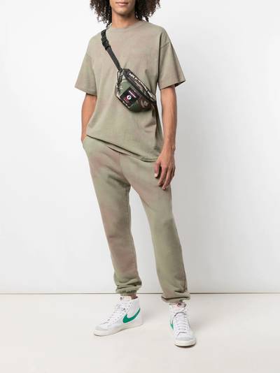 John Elliott LA camouflage-print track trousers outlook