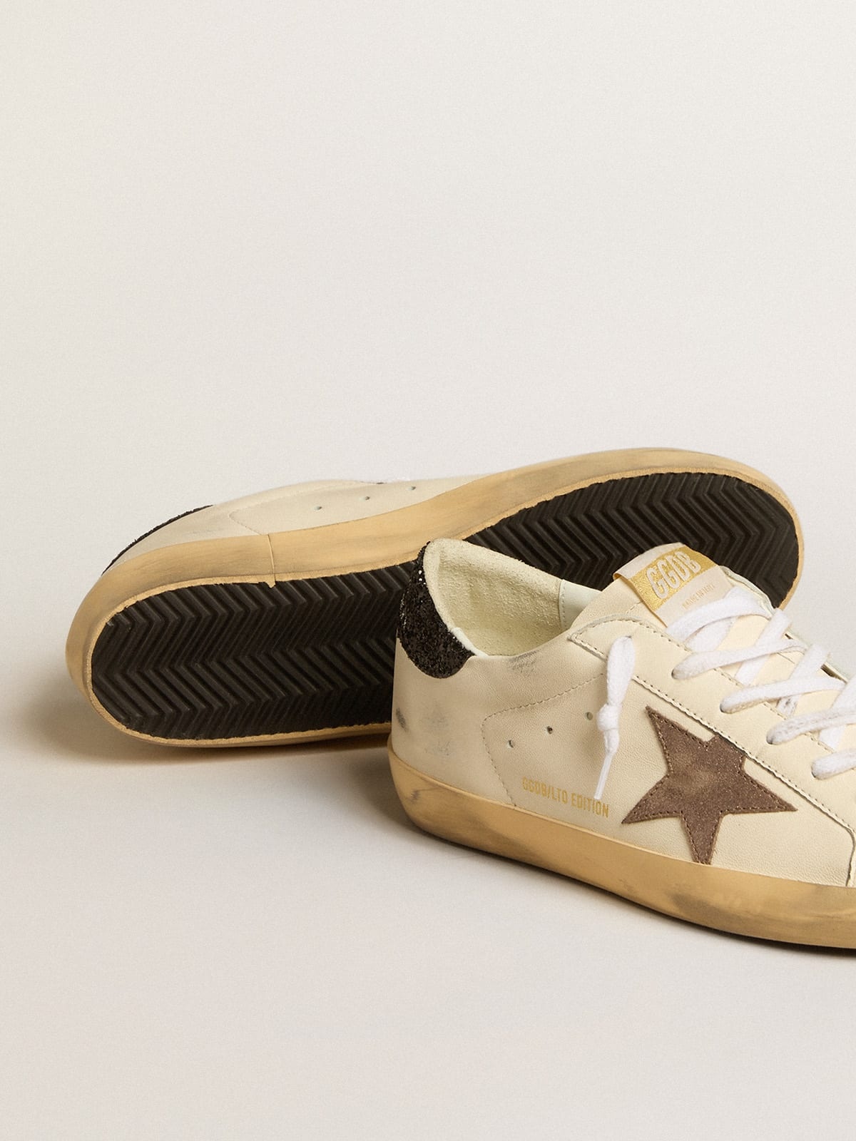 Golden Goose Super-Star LTD with laminated leather star and black glitter  heel tab | REVERSIBLE
