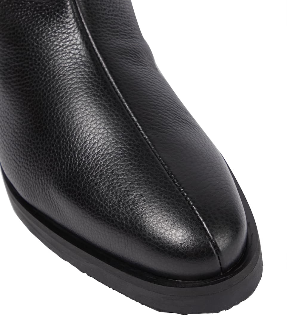 Faux fur-lined leather ankle boots - 6