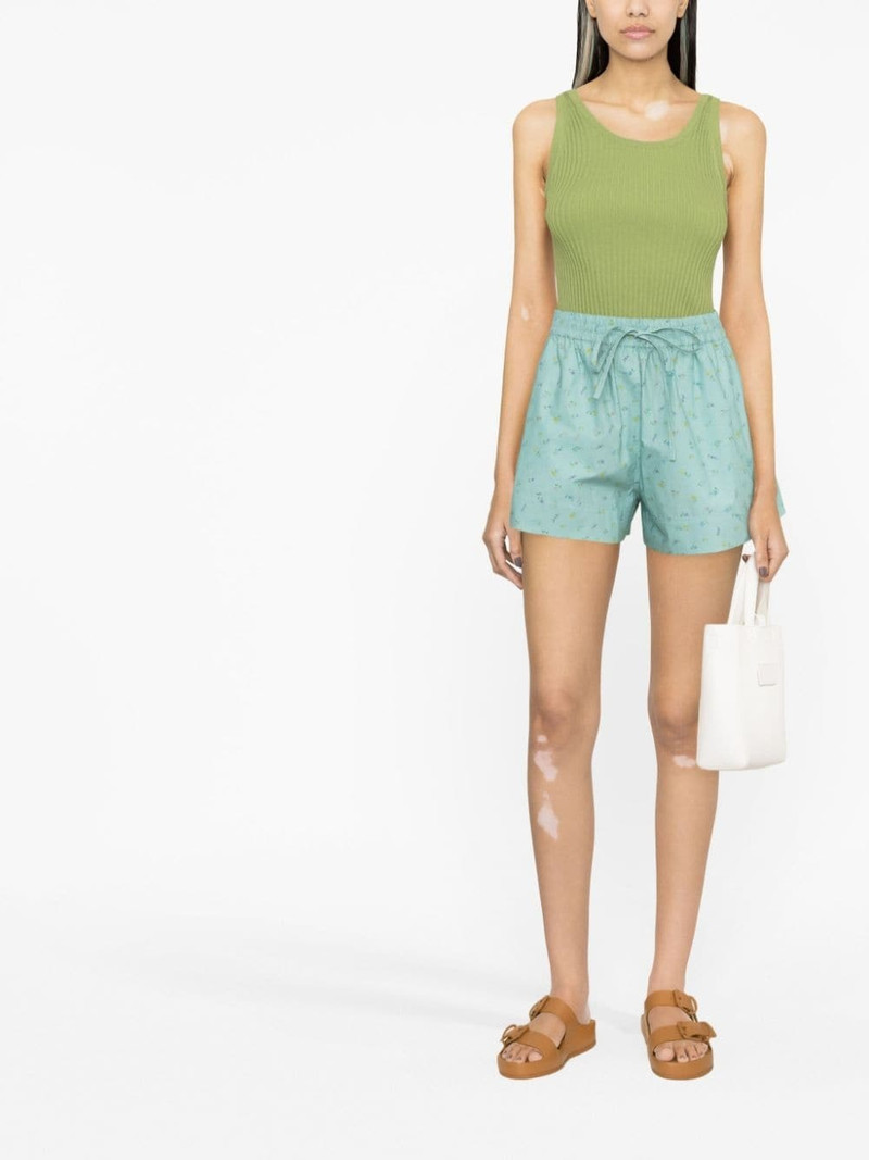 GANNI floral-print flared shorts outlook