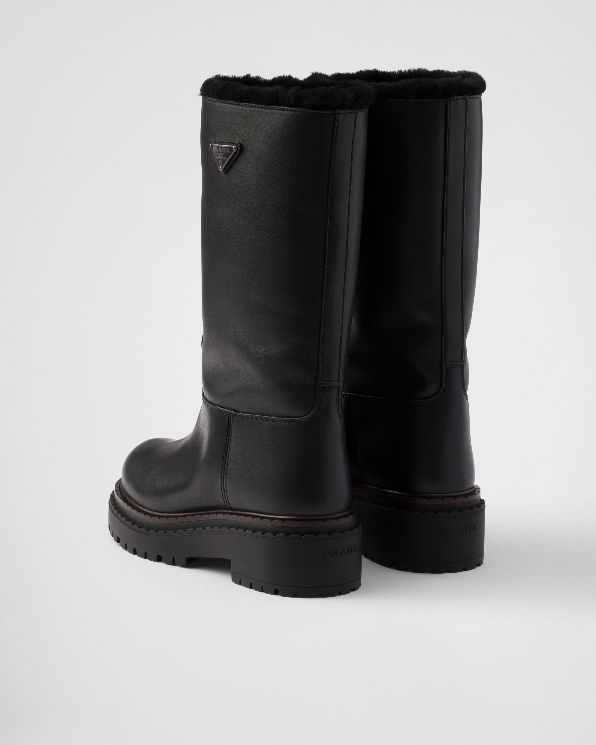 Leather and shearling boots - 5