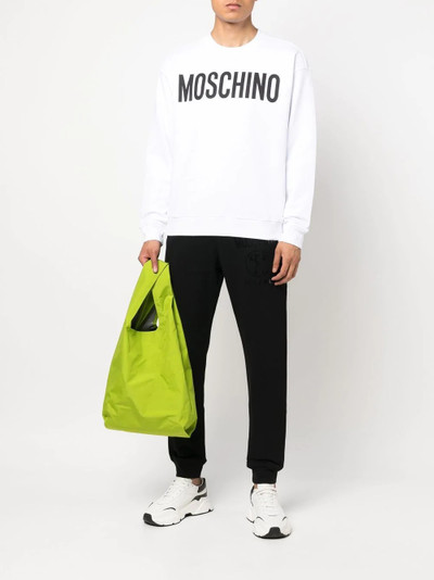 Moschino logo-print track pants outlook