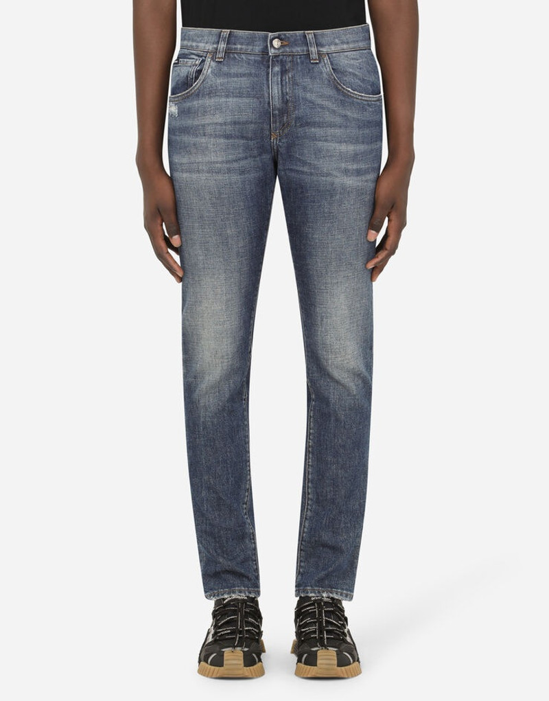 Blue skinny stretch jeans with small abrasions 2