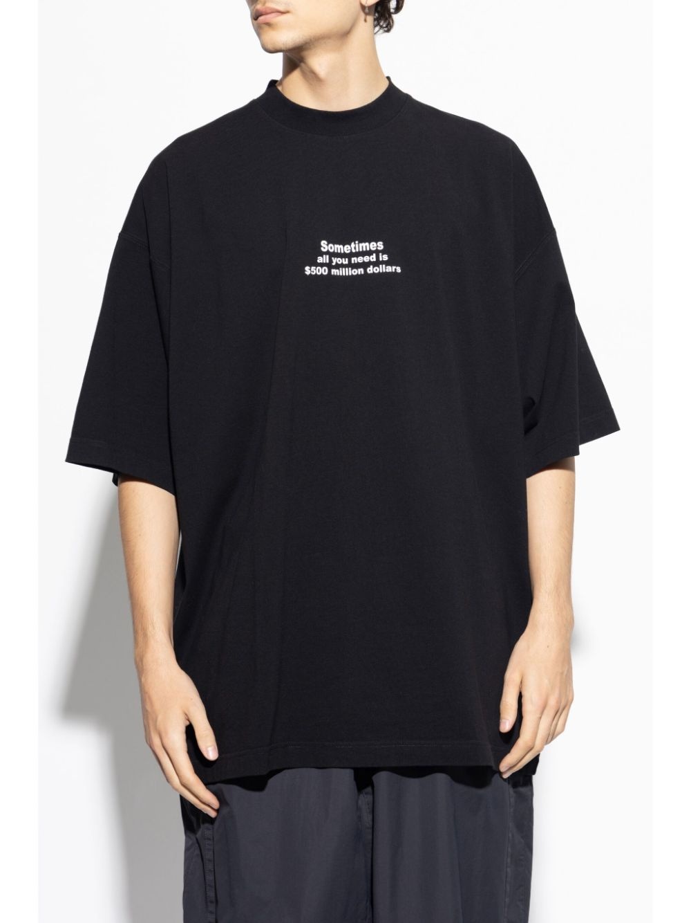 VETEMENTS slogan-print T-shirt | REVERSIBLE
