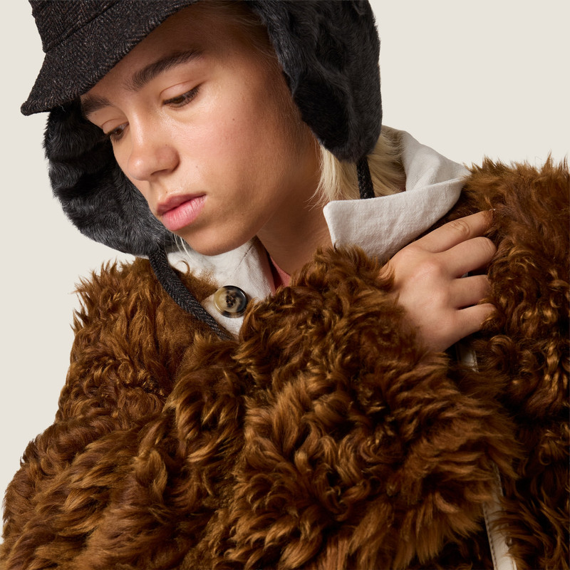 Reversible single-breasted linen and shearling jacket 6