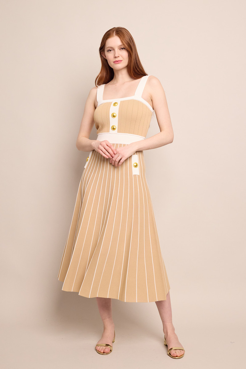 Cara Cara Aurora Dress
Sleek, Sculpted, and Subtly Bold with Sharp Stripes and a Gilded Touch outlook