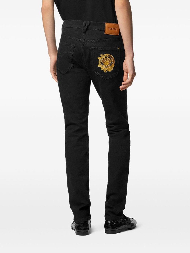 Medusa-embroidery jeans 4