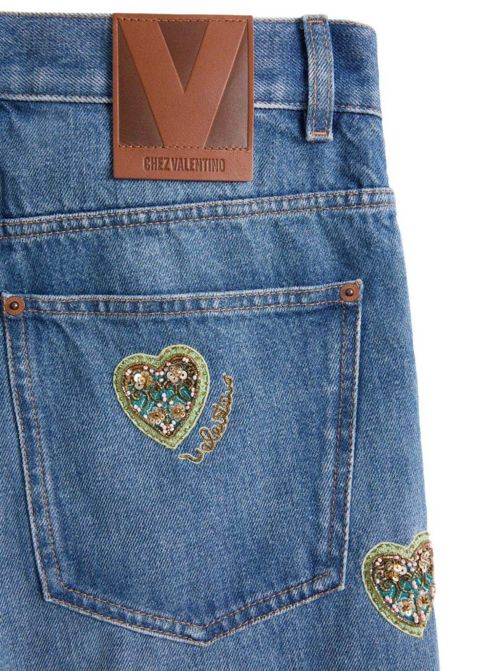 heart-embossed jeans - 6