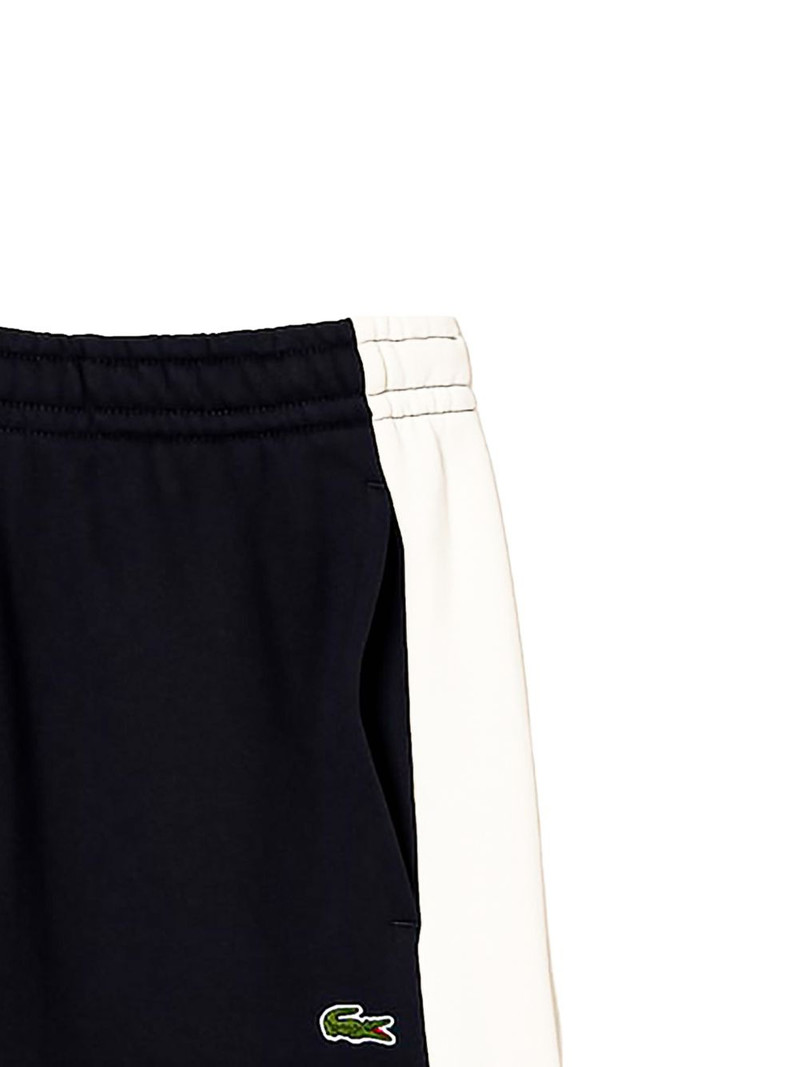 LACOSTE logo-patch colourblock track pants outlook
