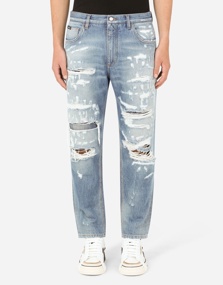 Loose light blue jeans with rips - 1