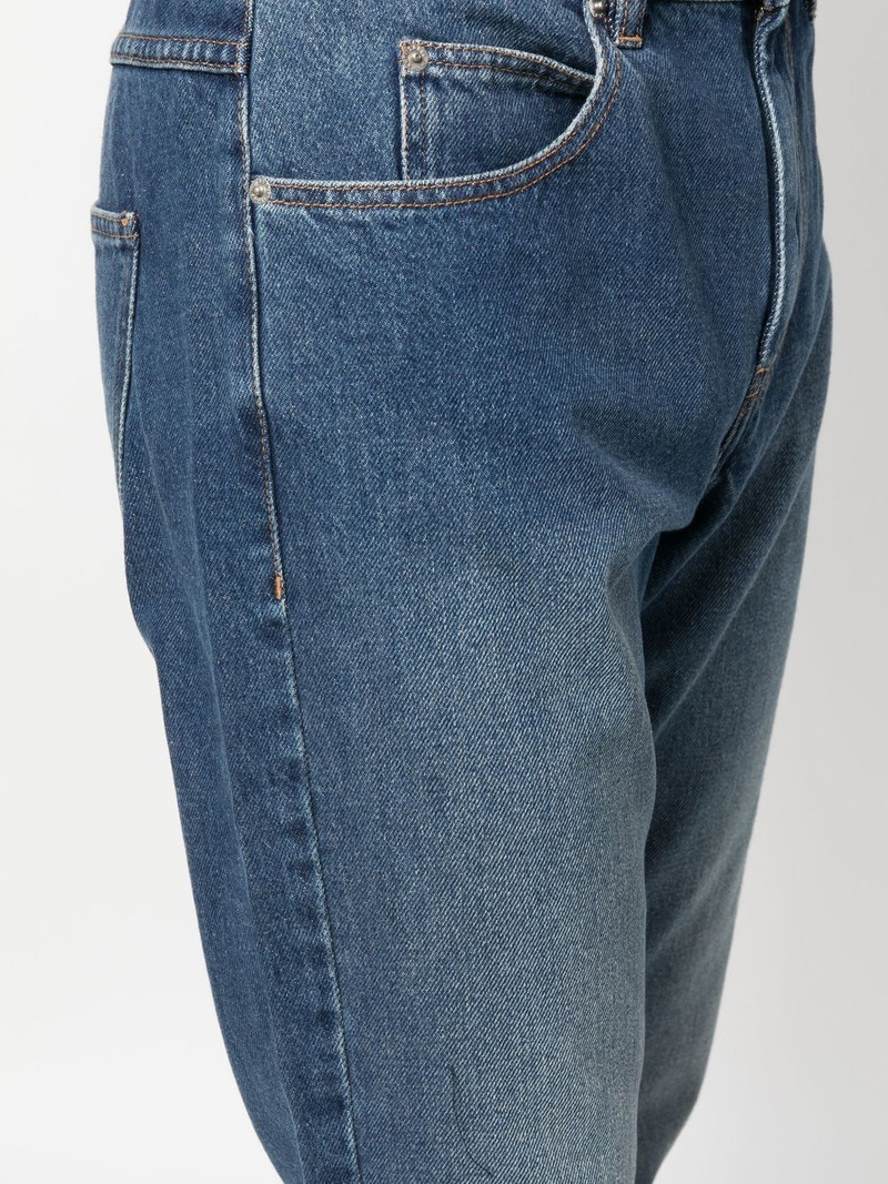straight-leg mid-wash jeans 5