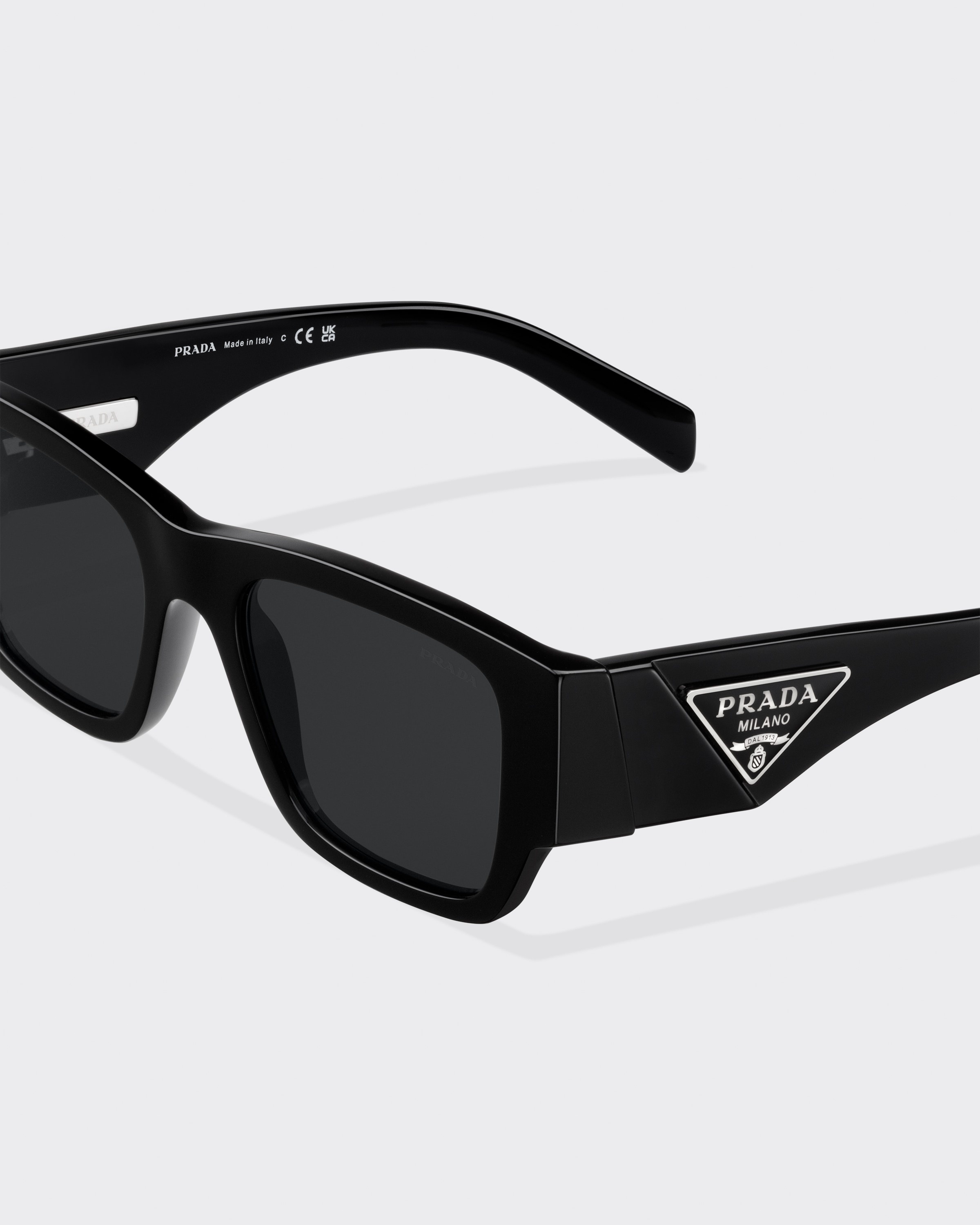 Prada Sunglasses with triangle logo | REVERSIBLE Prada Sunglasses with triangle logo | REVERSIBLE