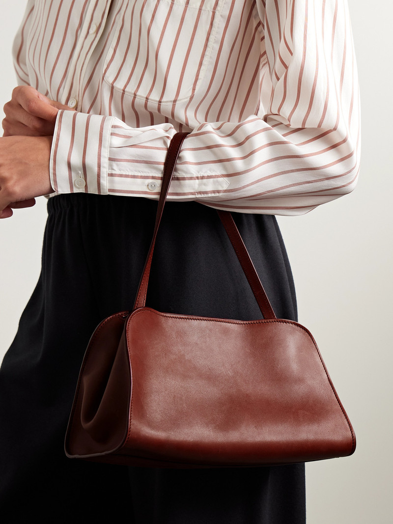 The Row Peggy Leather Clutch outlook
