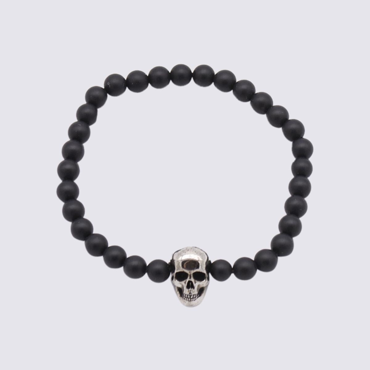 ALEXANDER MCQUEEN BLACK AND SILVER SKULL BRACELET - 1