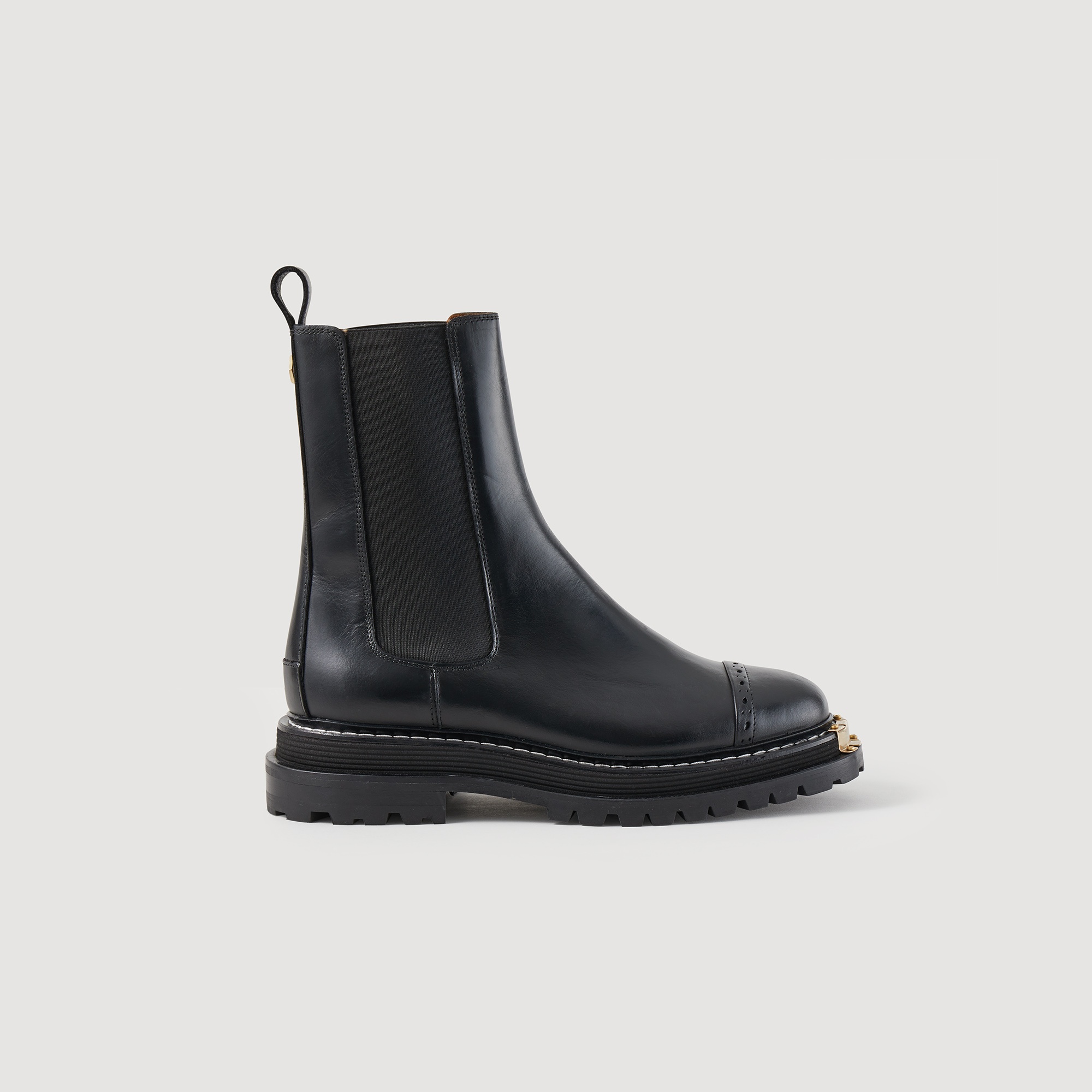 Ankle boots with notched sole - 1