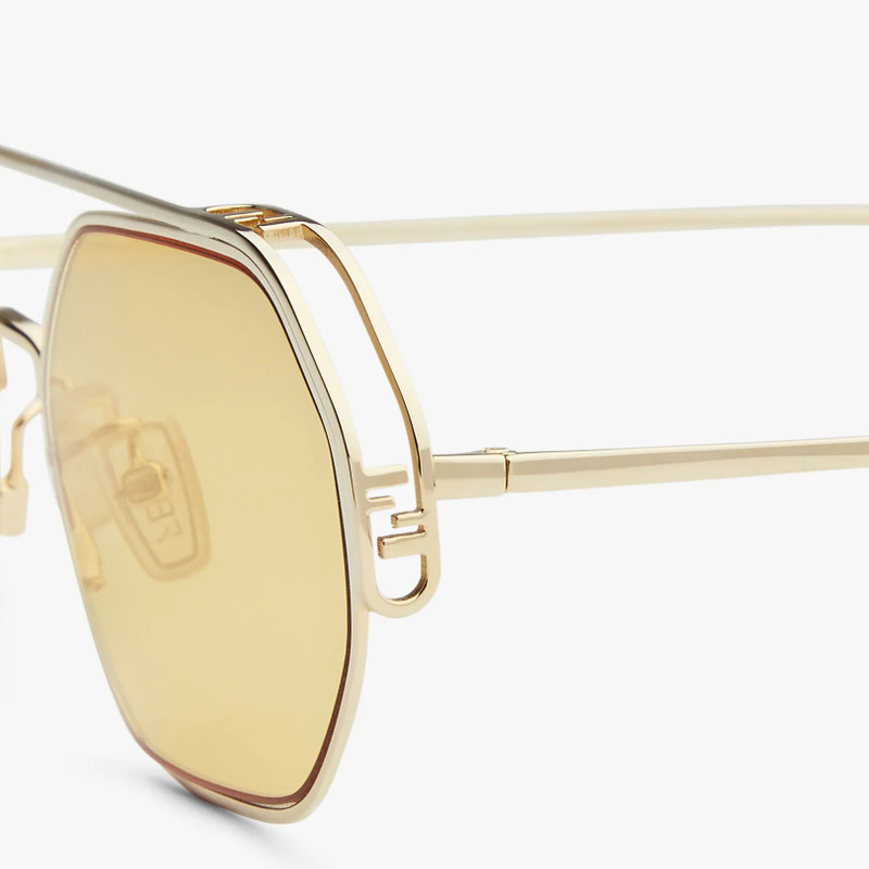 Sunglasses with gold-mirrored lenses 3