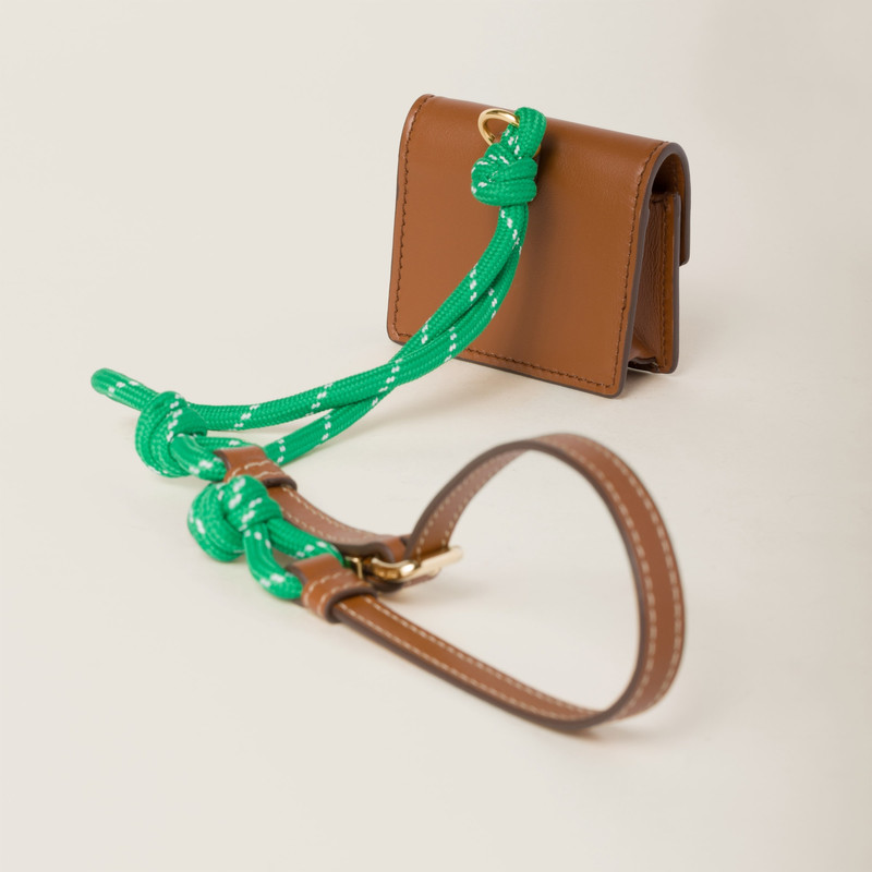 Leather, cord, and metal trick with mini-pouch 3