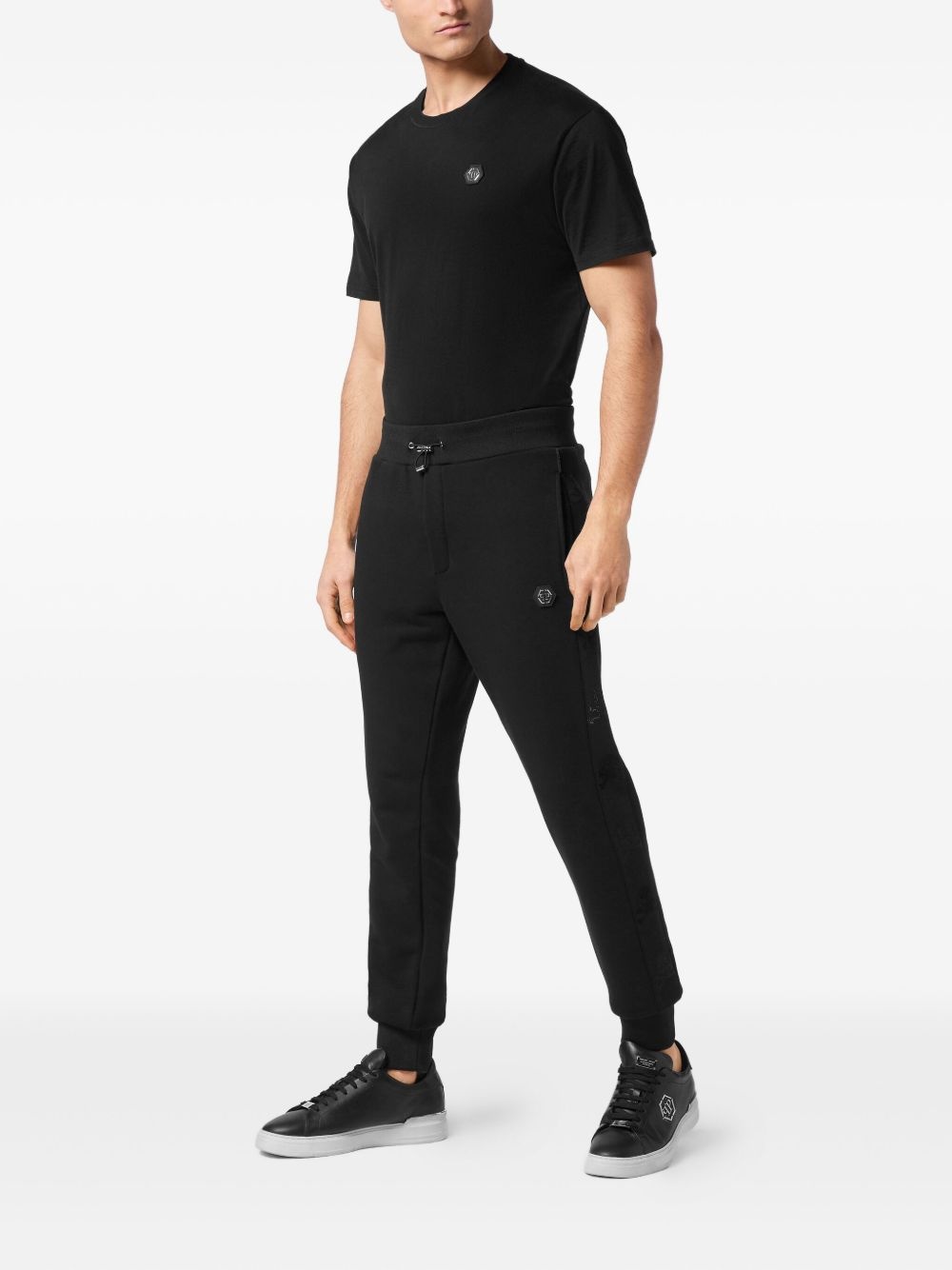 skull-studded track pants - 2
